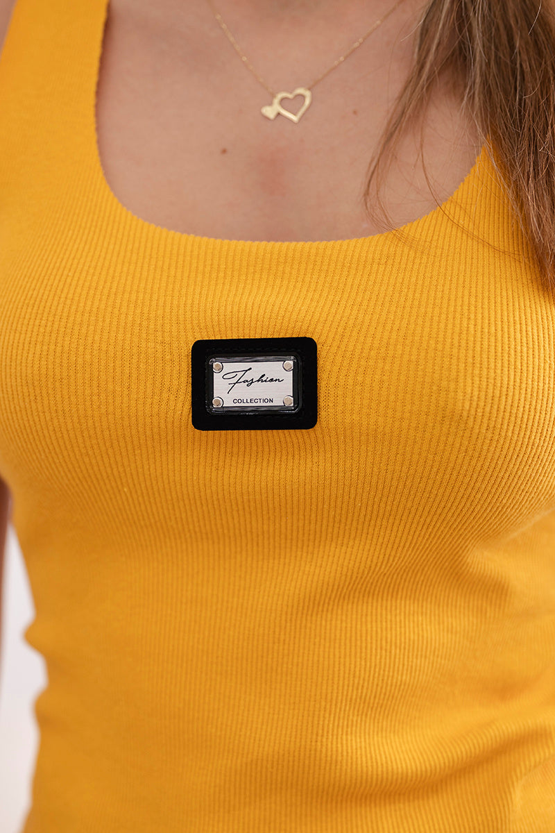 Раиран блуза с метална пластина